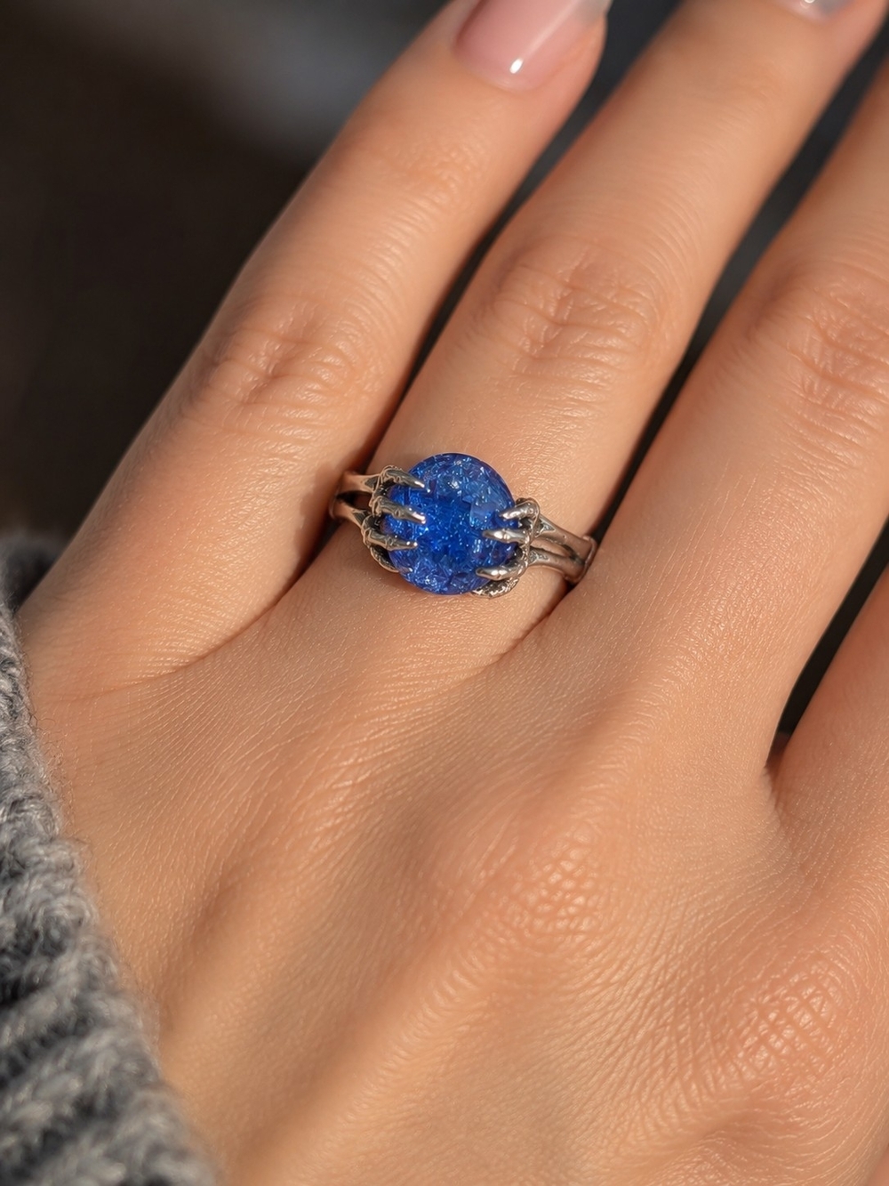 S925 Sterling Silver Ring Features A Brilliant Crackle Blue Gemstone.